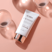 Tube of d'Alba Waterfull Tone-Up Sun Cream (Pink) background