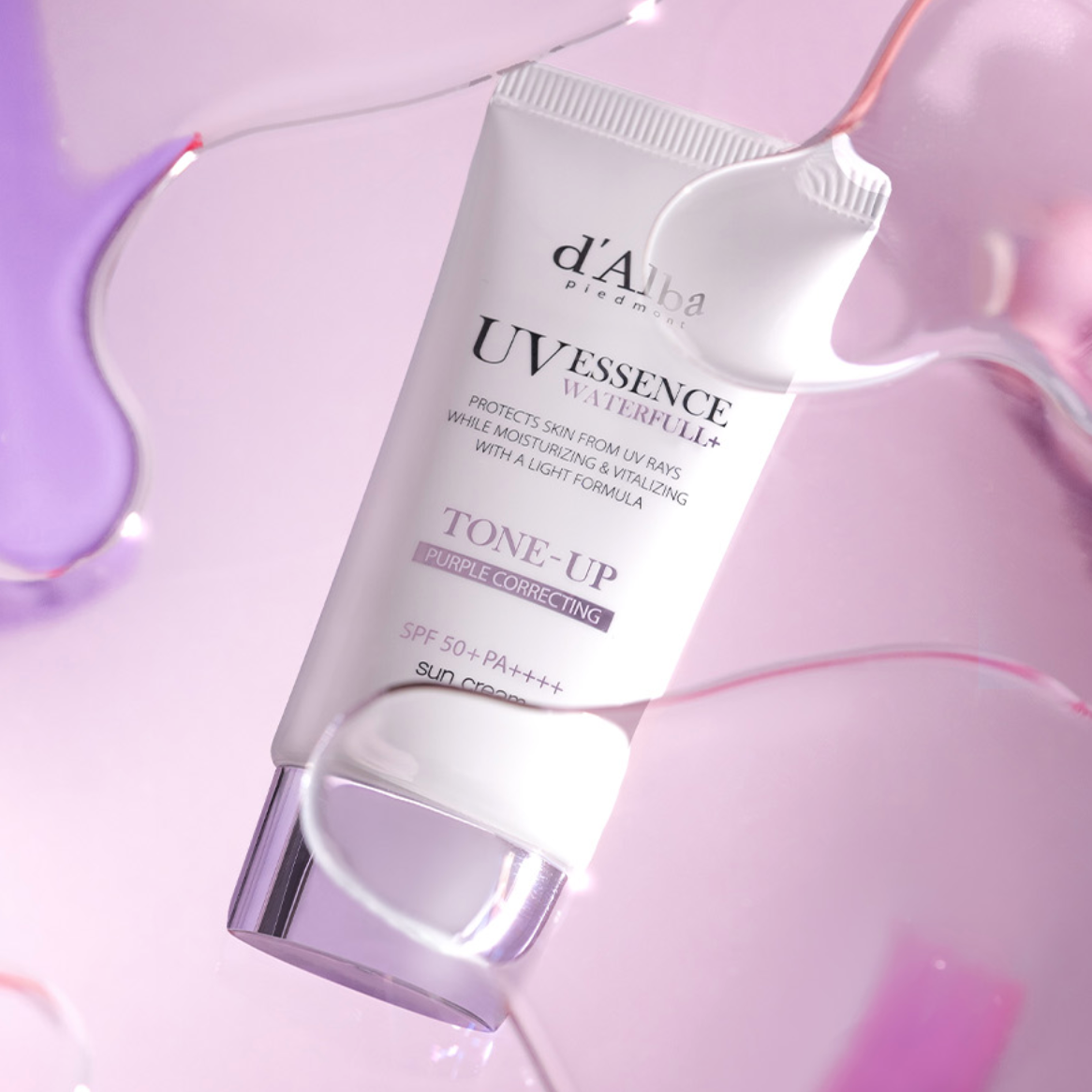 Tube of d'Alba Waterfull Tone-Up Sun Cream (Purple) on a pink and purple gradient background