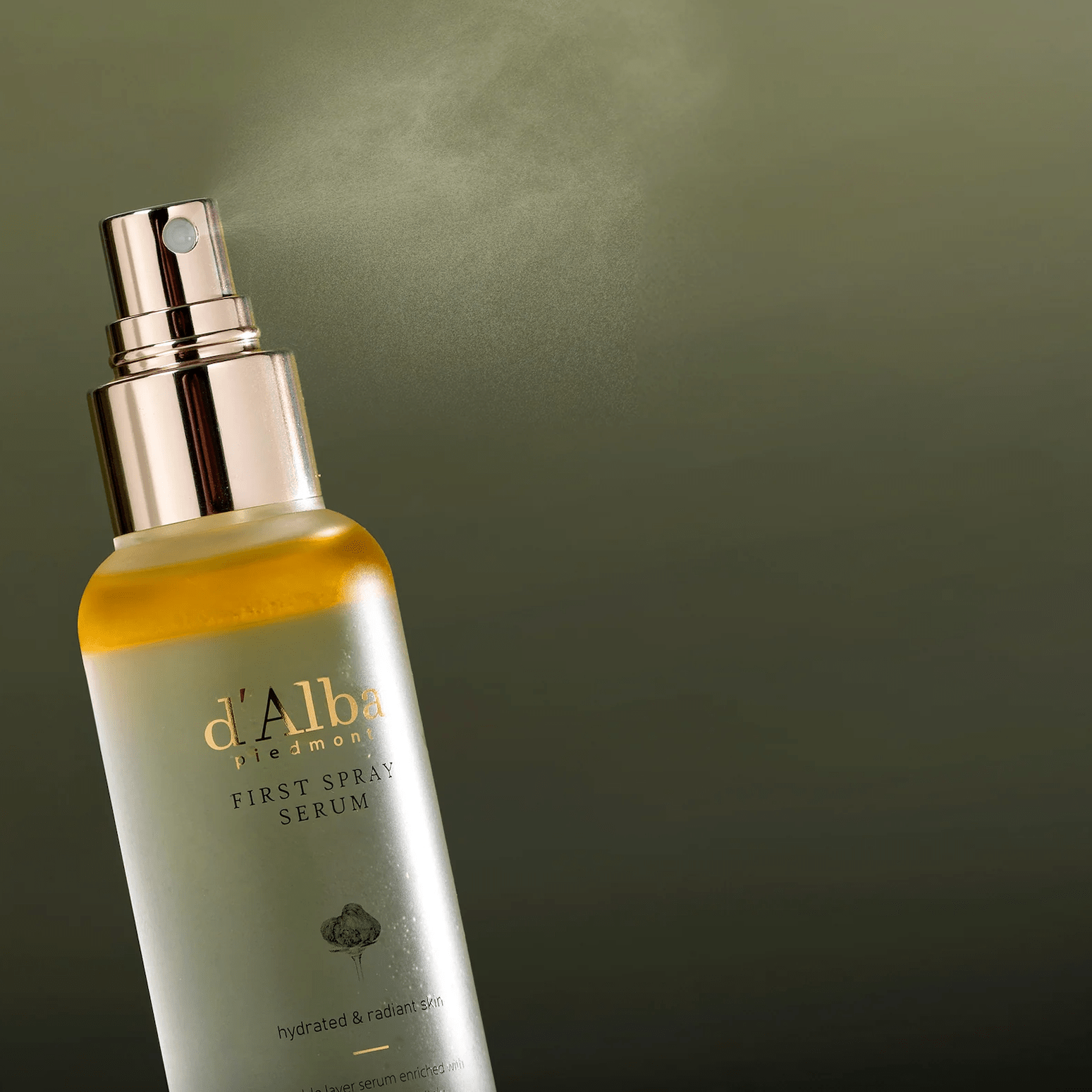 d'Alba skincare serum bottle with mist being released on a dark green background