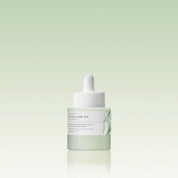 SKIN1004 Madagascar Centella Azelaic Acid 10 Ampoule with a green and white design on a light green background